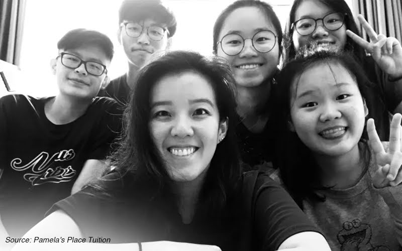 Group photo of a tuition teacher and students