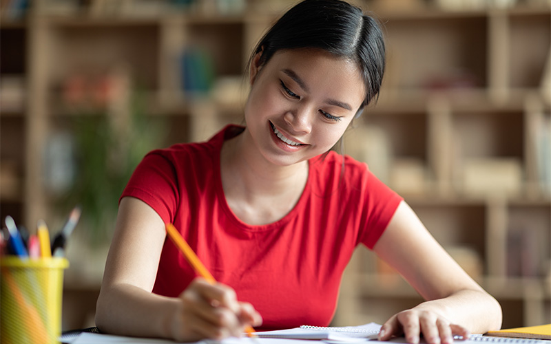 Image of a student calmly answering a test