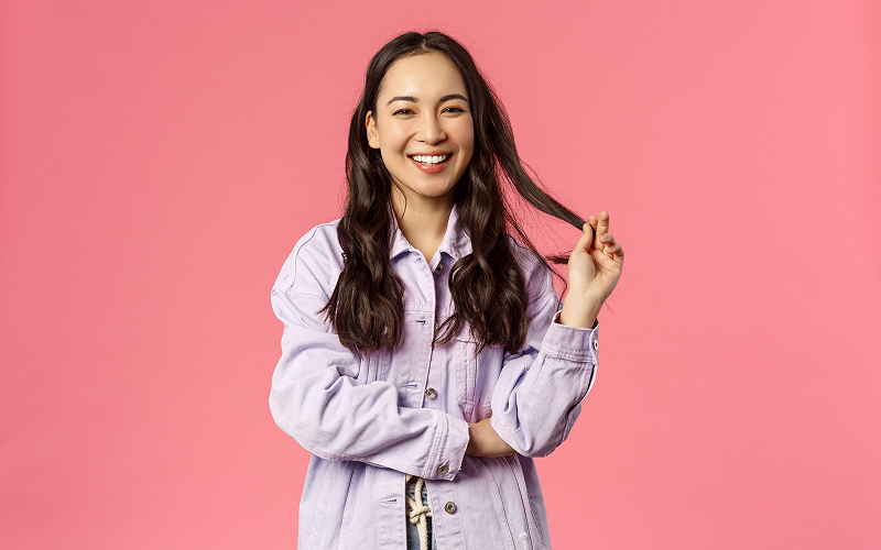 A confident woman sporting a new hairstyle