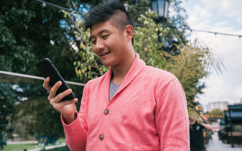 A stock photo related to person using a smartphone