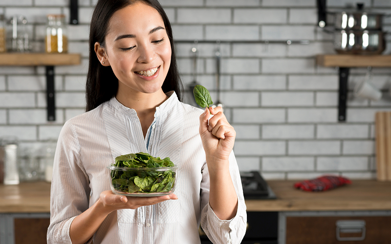Image of a person eating vegetarian food