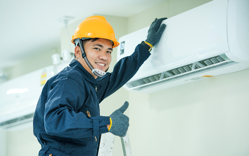 A stock photo of aircon technician