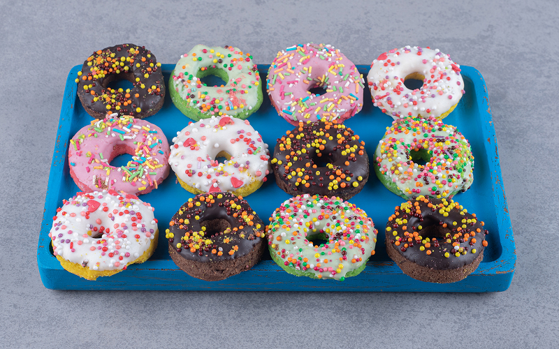 A tray full of doughnuts