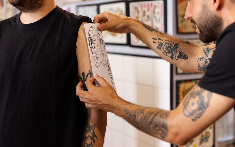 Image of a person being prepped for a tattoo.