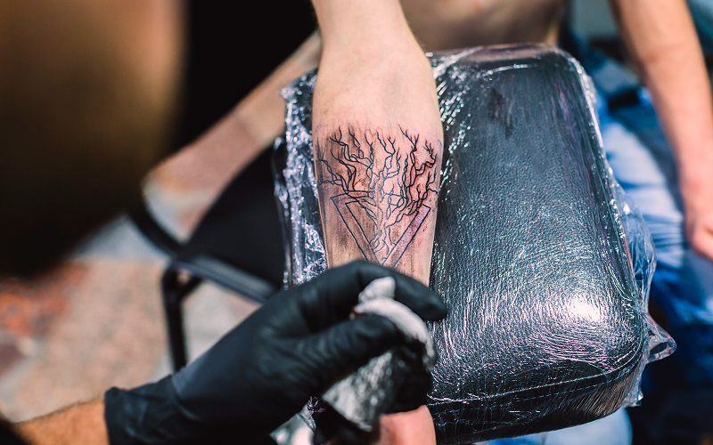 Image of a person with a fresh tattoo.