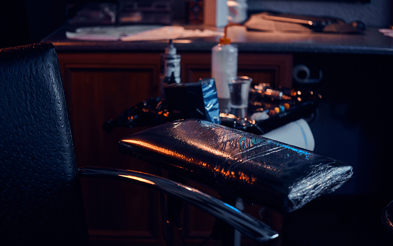 Image of a tattoo equipment scattered everywhere.