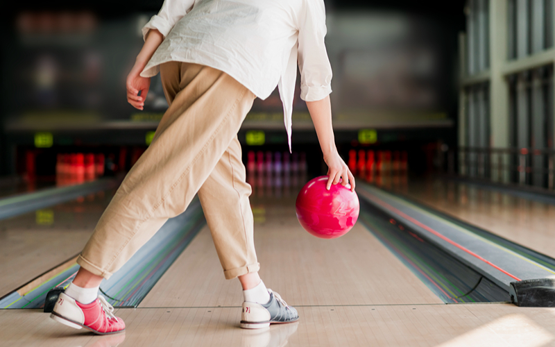 Image of a person about to bowl a ball